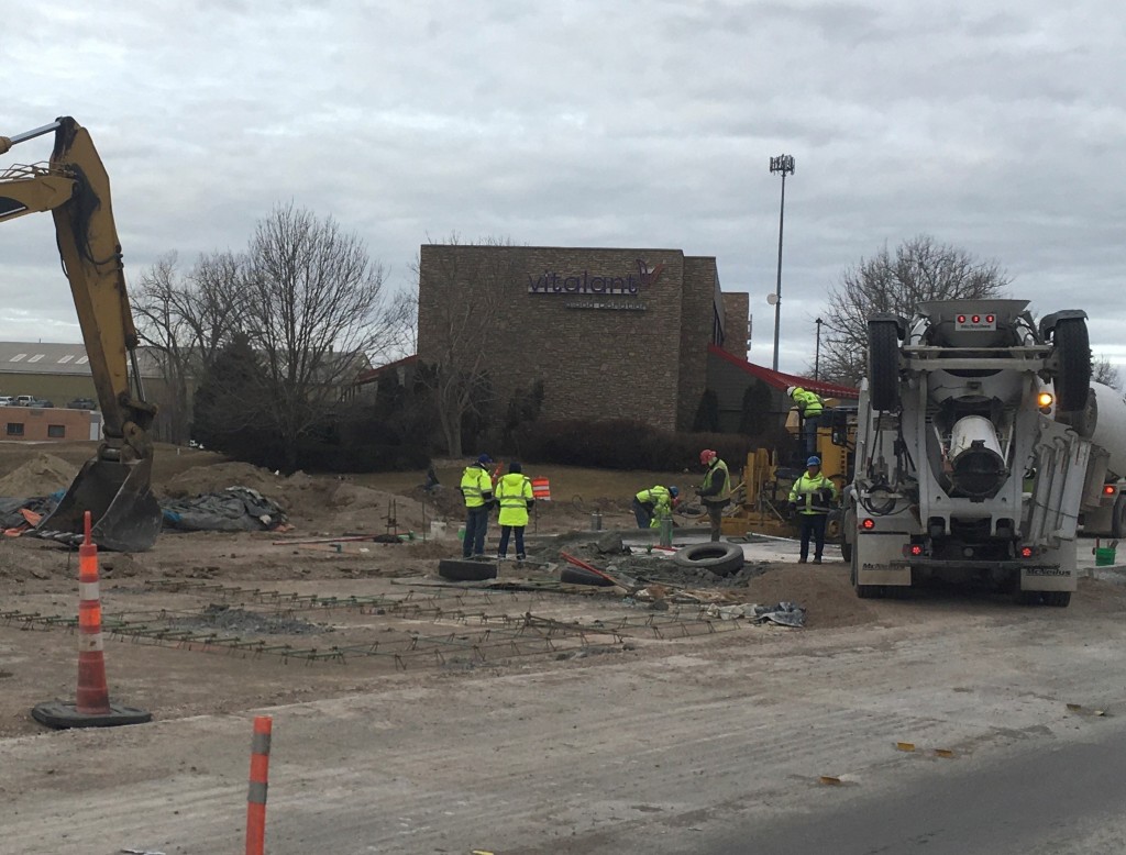 Placing Concrete for Curb West of Rapid Creek Bridge, Omaha Street, Rapid City, South Dakota, Wednesday, January 12, 2022